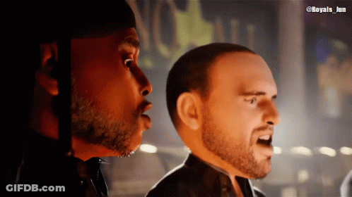 Two Men Singing In Front Of No Sign GIF
