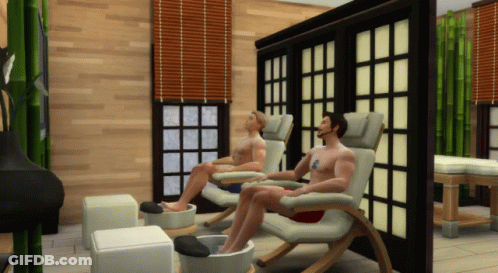 Two Men Sit In Chairs With Their Feet In A Tub GIF