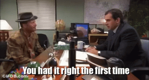 Two Men Sitting At A Desk With The Words You Had It Right The First Time Written On The Bottom GIF