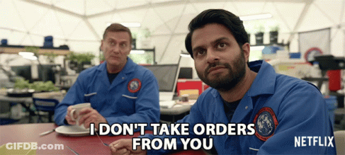 Two Men Sitting At A Table With One Saying I Don 'T Take Orders From You GIF