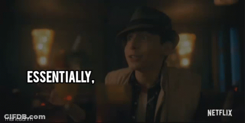 Two Men Sitting At A Table With The Words We 'Re Screwed On The Screen GIF