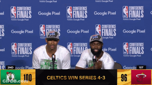 Two Men Sitting At Conference Finals Wall GIF