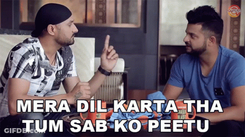 Two Men Sitting At Table One Pointing GIF