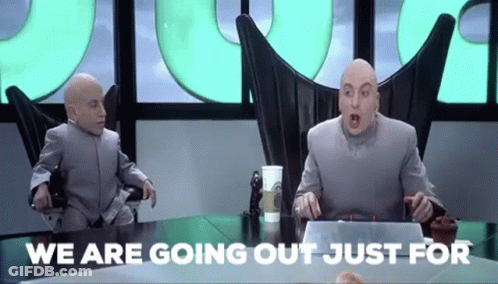 Two Men Sitting At Table Saying We Are Going Out Just For GIF