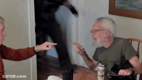 Two Men Sitting At Table With Coors Light GIF