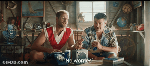 Two Men Sitting At Table With Radio And Soda GIF