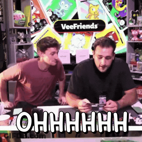 Two Men Sitting At Veefriends Sign GIF