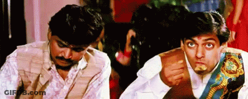 Two Men Sitting Eating Food GIF