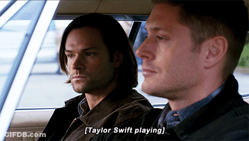 Two Men Sitting In Car Talking About Taylor Swift GIF