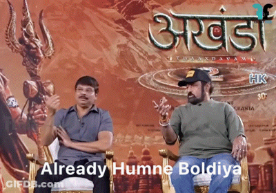 Two Men Sitting In Front Of Poster Saying Already Humne Boldiya GIF
