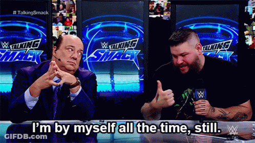 Two Men Sitting In Front Of Talking Smack Sign GIF