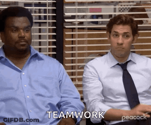 Two Men Sitting Next To Each Other GIF