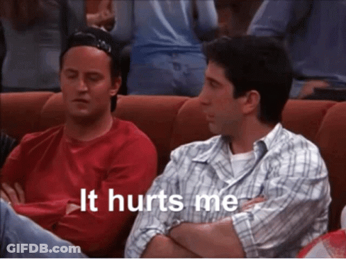Two Men Sitting Next To Each Other Saying It Hurts Me GIF