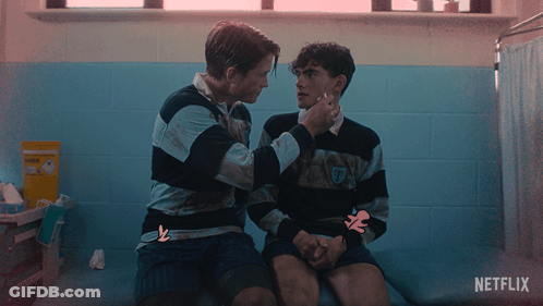 Two Men Sitting Next To Each Other With A Netflix Logo On The Bottom GIF