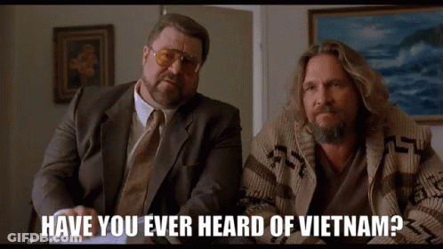 Two Men Sitting Next To Each Other With The Words Have You Ever Heard Of Vietnam On The Bottom GIF