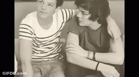 Two Men Sitting On A Couch GIF
