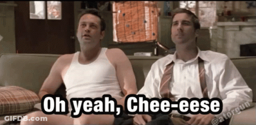 Two Men Sitting On A Couch With The Words Oh Yeah Chee-Eese Above Them GIF