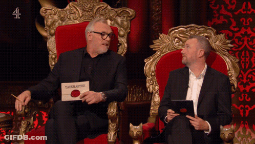 Two Men Sitting On A Throne With A Sign That Says Taskmaster GIF