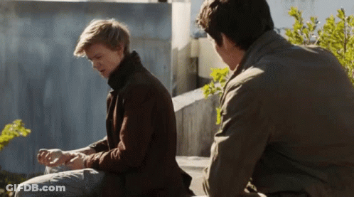 Two Men Sitting On Bench Talking GIF