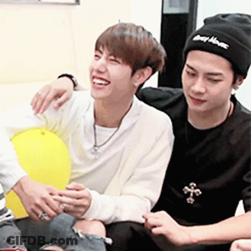 Two Men Sitting On Couch Laughing GIF