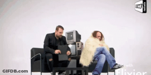 Two Men Sitting On Couch Made With Flivier GIF