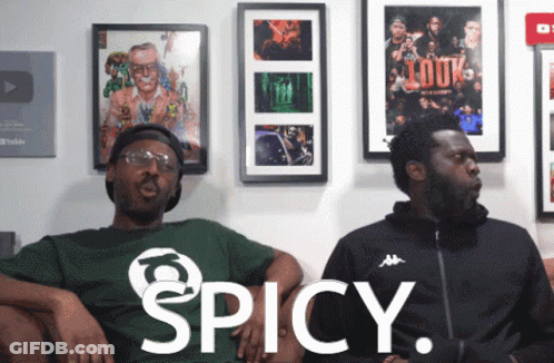 Two Men Sitting On Couch Spicy GIF