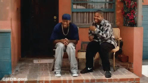 Two Men Sitting On Porch Talking GIF