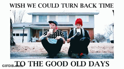 Two Men Sitting On The Side Of The Road With The Words Wish We Could Turn Back Time To The Good Old Days Above Them GIF