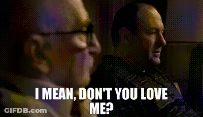 Two Men Sitting One Asking If He Loves Him GIF