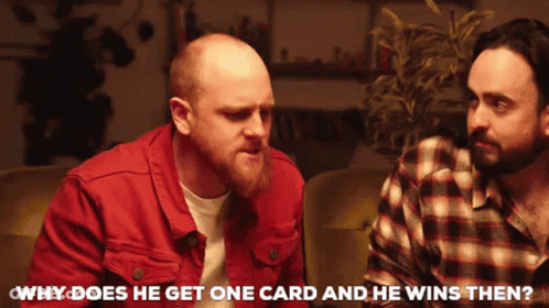 Two Men Sitting, One Asking Why Does He Get One Card And He Wins Then GIF