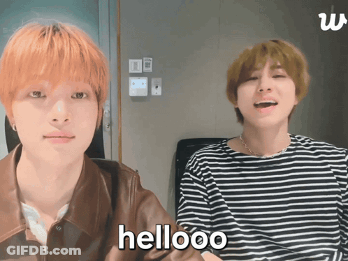 Two Men Sitting One Says Hellooo GIF