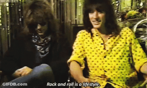 Two Men Sitting Saying Rock And Roll Is A Lifestyle GIF