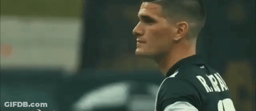 Two Men Sitting Together GIF