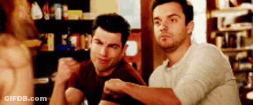 Two Men Sitting With Crossed Arms GIF