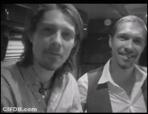 Two Men Smiling Black And White Photo GIF