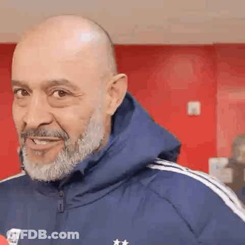 Two Men Smiling For A Picture GIF