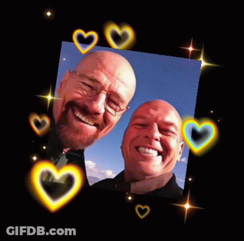 Two Men Smiling In A Cube GIF