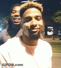 Two Men Smiling Together GIF
