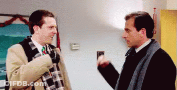 Two Men Standing And Talking GIF