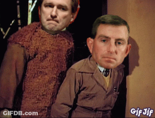 Two Men Standing Beside Each Other GIF
