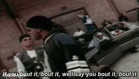 Two Men Standing By Car GIF