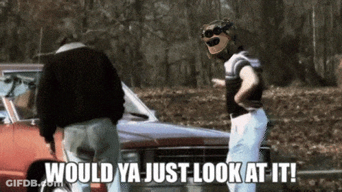 Two Men Standing By Car Saying Would Ya Just Look At It GIF