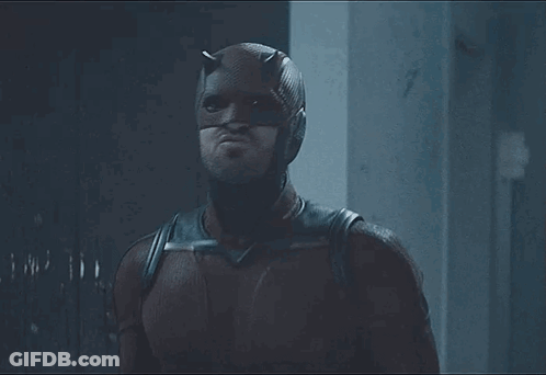 Two Men Standing By Window GIF