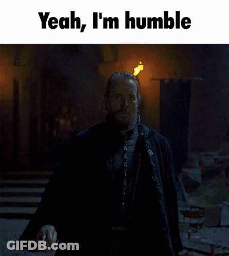Two Men Standing In A Dark Room With The Words Yeah I 'M Humble GIF