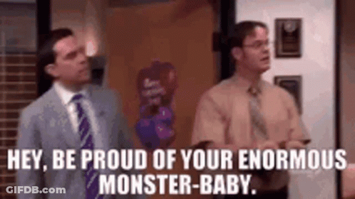 Two Men Standing In A Room GIF