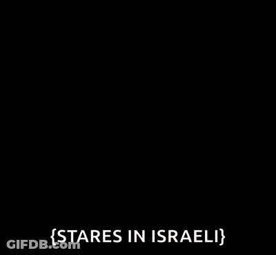 Two Men Standing In A Room One Talking About Israel GIF