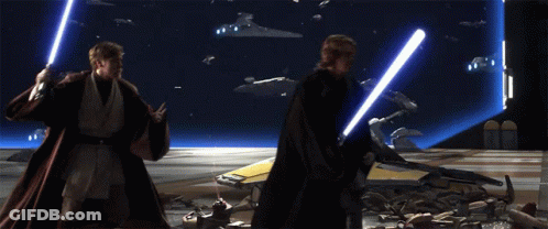 Two Men Standing In Dark Room GIF