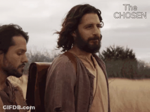 Two Men Standing In Field With The Chosen GIF