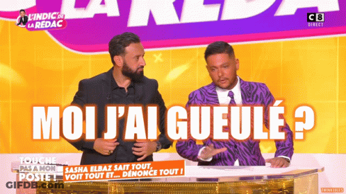 Two Men Standing In Front Of A Sign That Says Moi J'ai Gueule ? GIF