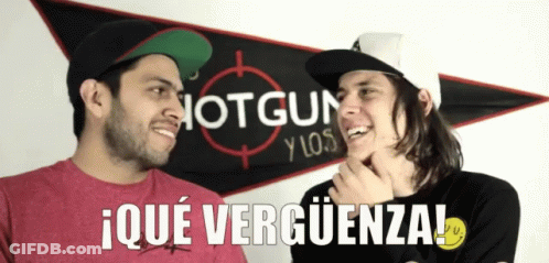 Two Men Standing In Front Of A Sign That Says Shotgun Y Los GIF